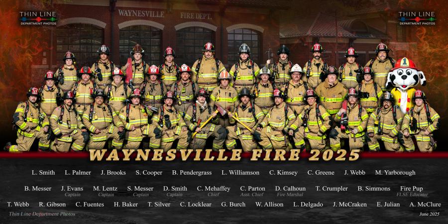 Full department photo in firefighting gear.